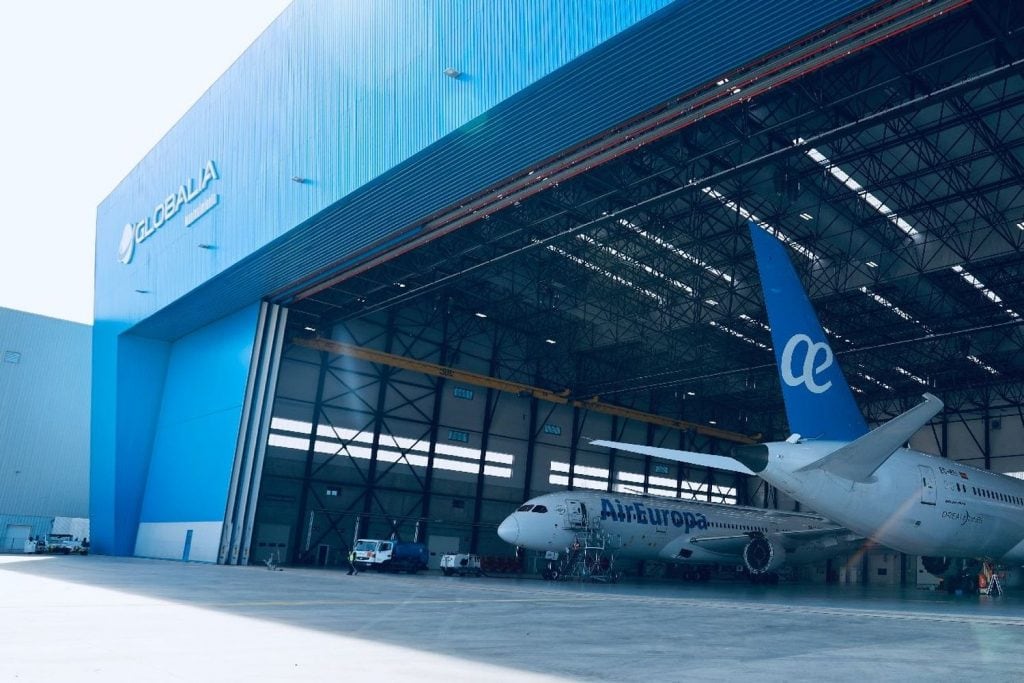 Air Europa aircraft inside a modern Globalia Corp hangar for maintenance and operations.