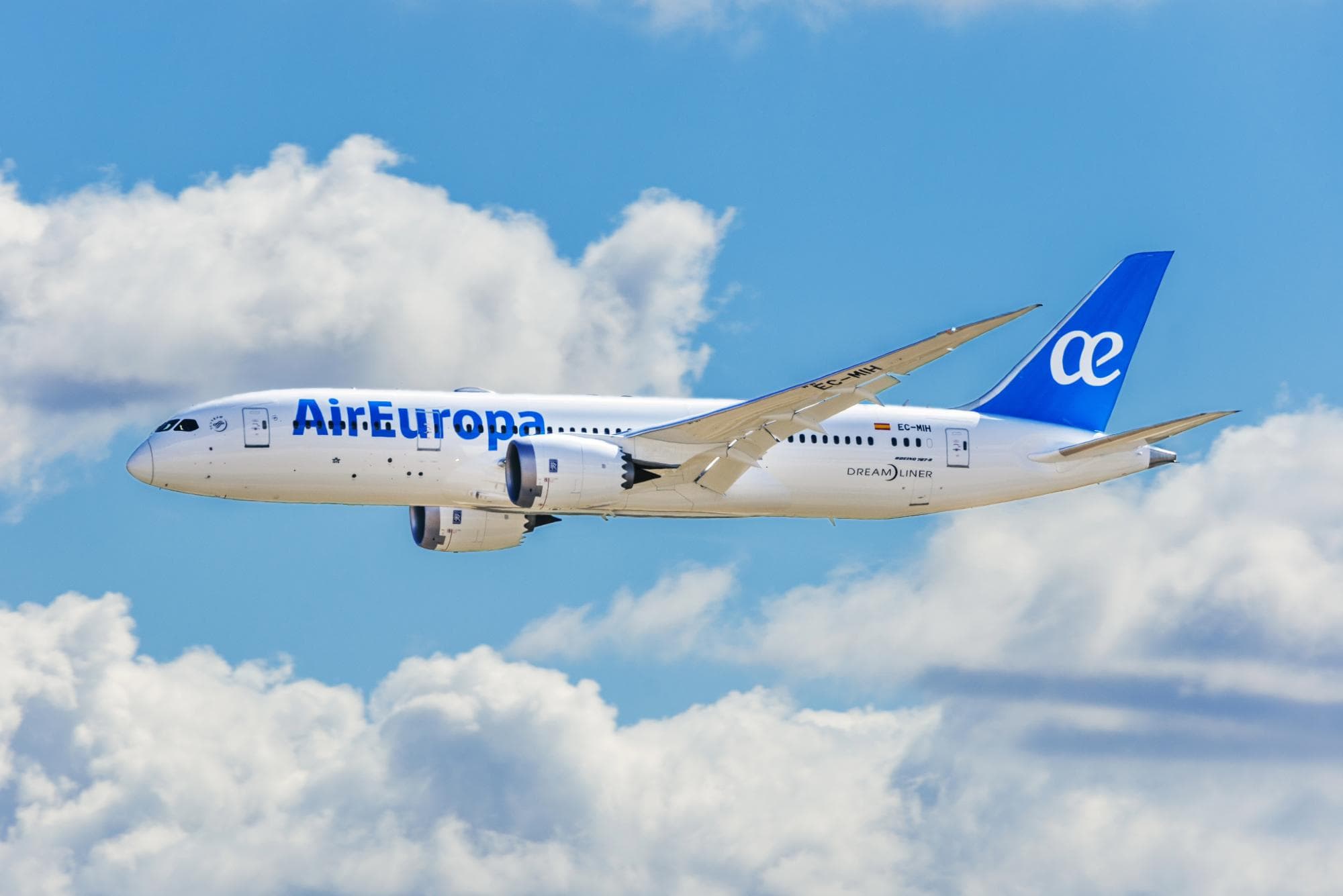 Air Europa airplane in flight featuring global airline branding and modern aircraft design.