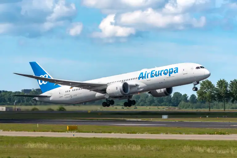 Air Europa aircraft taking off from runway, showcasing global air travel and airline services.